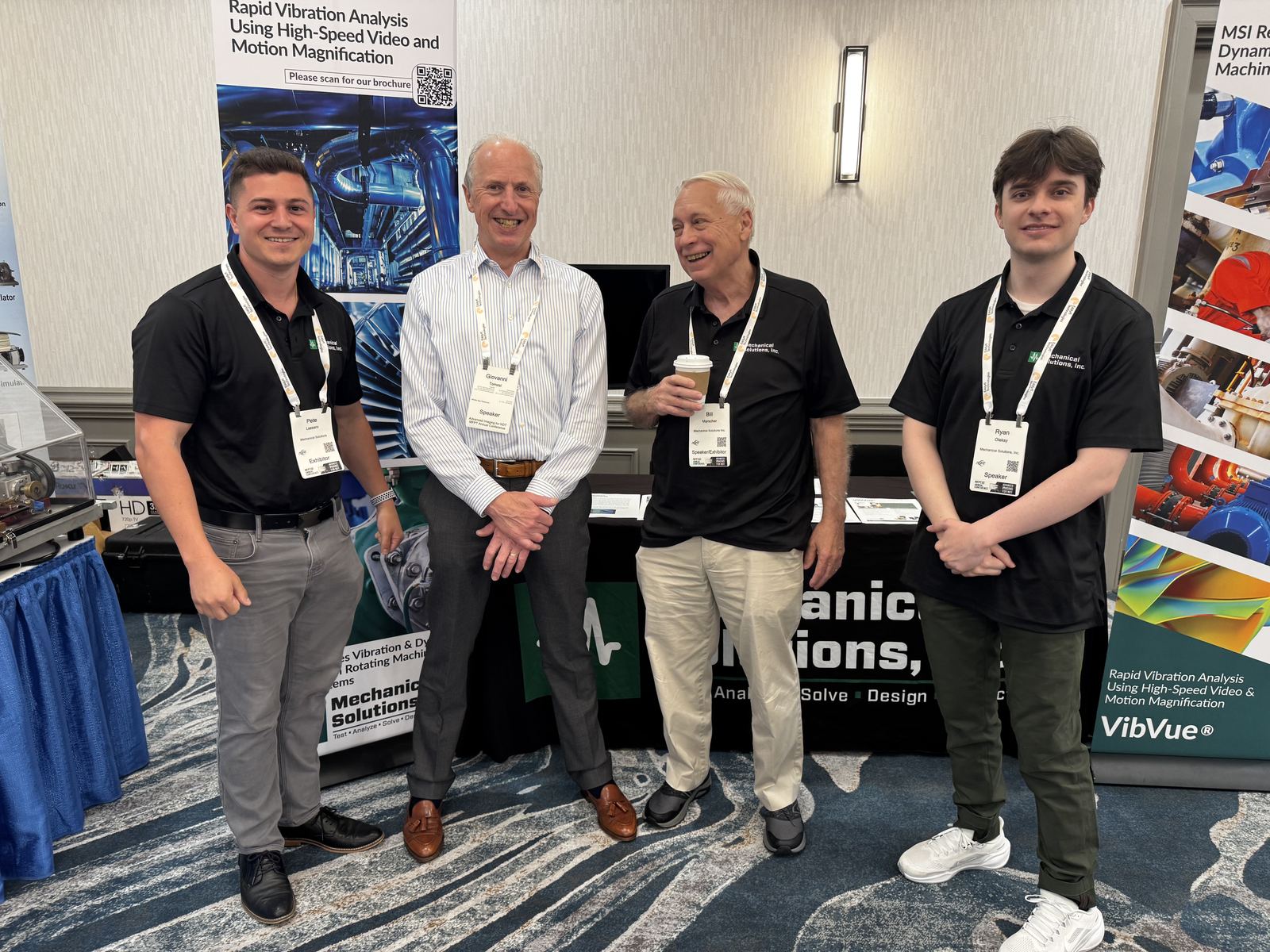Pete with colleagues at the VibVue trade show booth